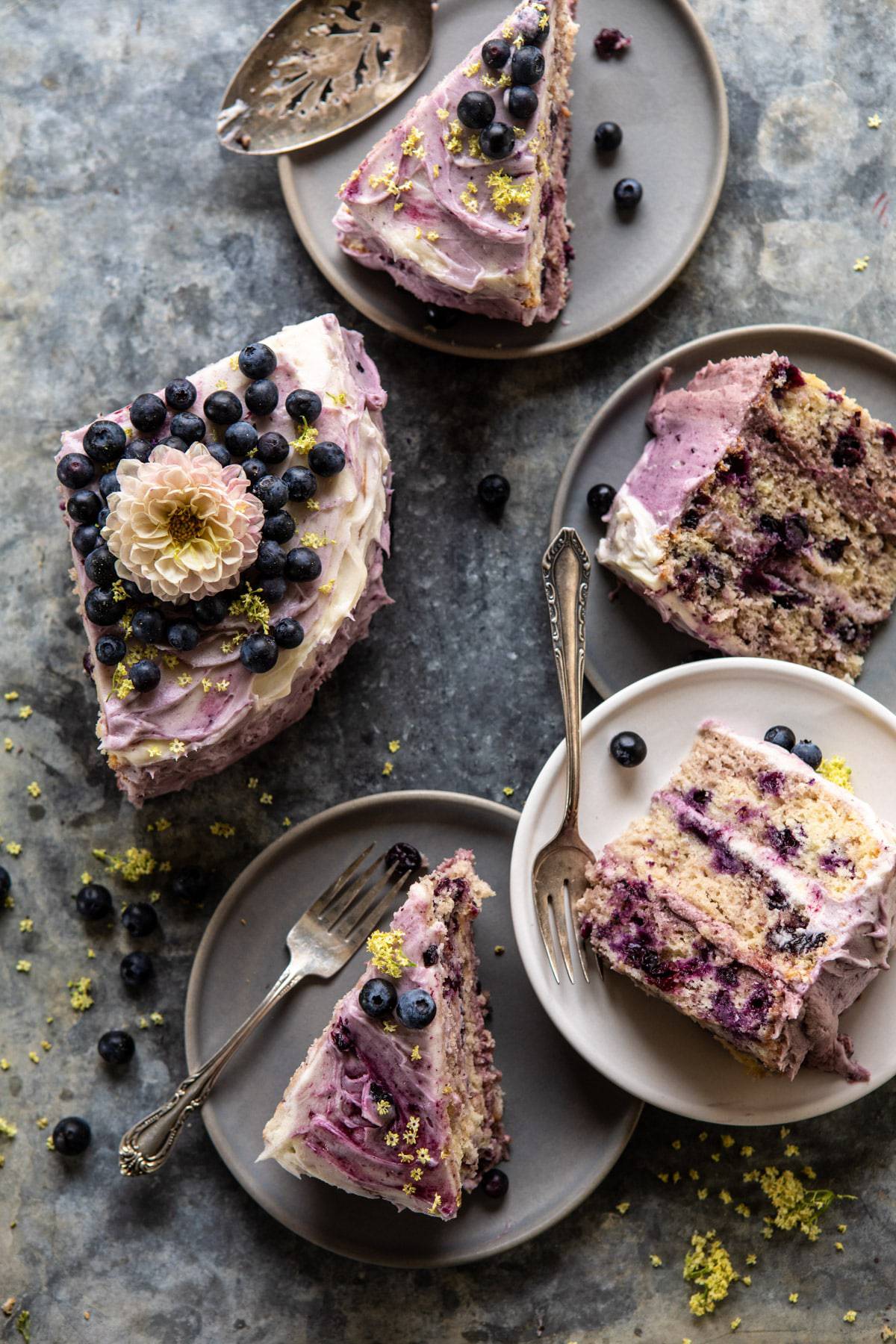 Bursting Blueberry Lemon Layer Cake | halfbakedharvest.com #bleberrycake #layercake #summerrecipes #dessert