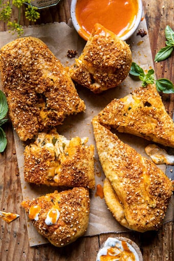 Cheesy Buffalo Chicken Strombolis | halfbakedharvest.com