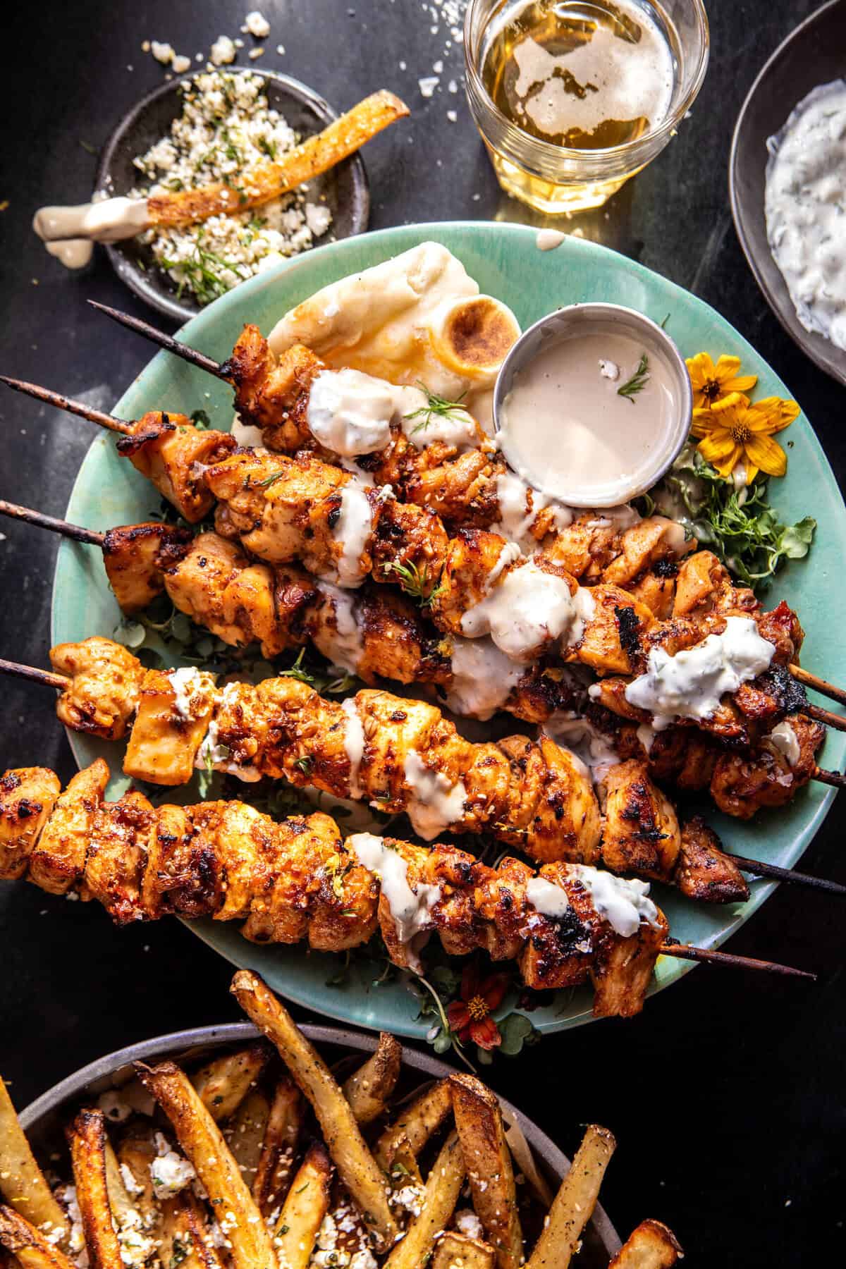 Chicken Tzatziki Skewers with Feta Fries | halfbakedharvest.com