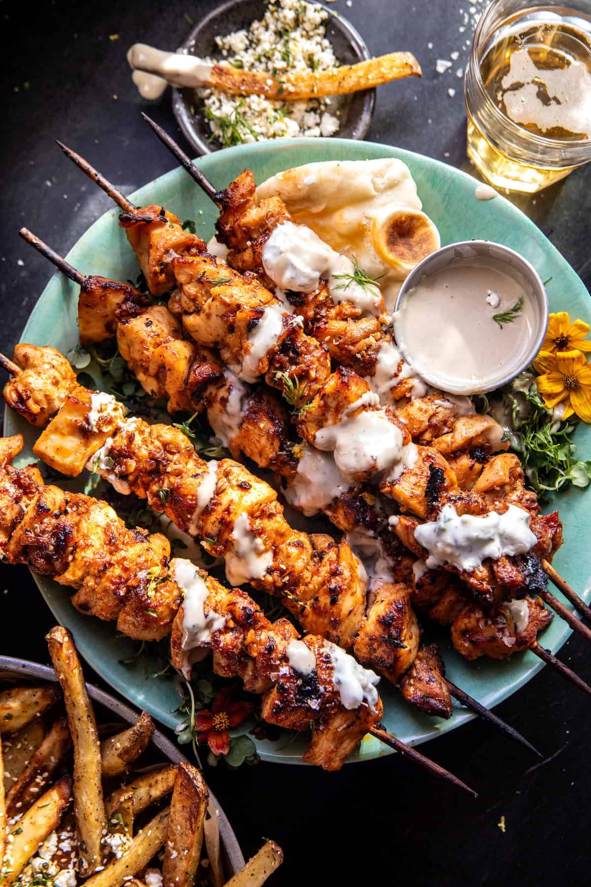 Chicken Tzatziki Skewers with Feta Fries | halfbakedharvest.com