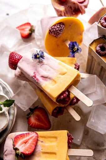 Creamy Strawberry Mango Popsicles | halfbakedharvest.com