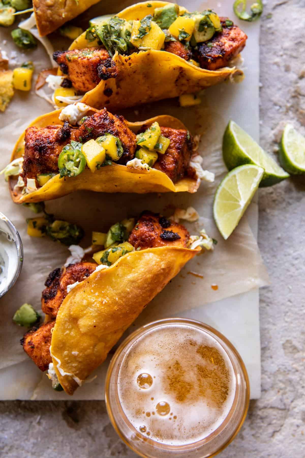 Crispy BBQ Salmon Tacos with Avocado Mango Salsa and Jalapeño Cream | halfbakedharvest.com