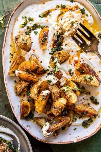 Crispy Oregano Roasted Potatoes with Creamy Feta Sauce | halfbakedharvest.com