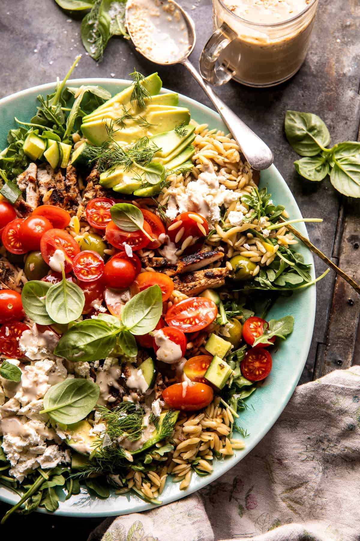 Greek Tahini Chicken and Feta Orzo Bowls | halfbakedharvest.com