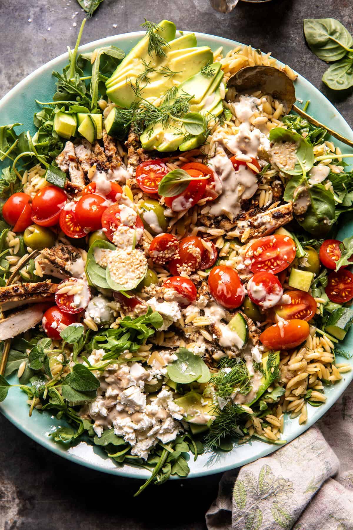 Greek Tahini Chicken and Feta Orzo Bowls | halfbakedharvest.com