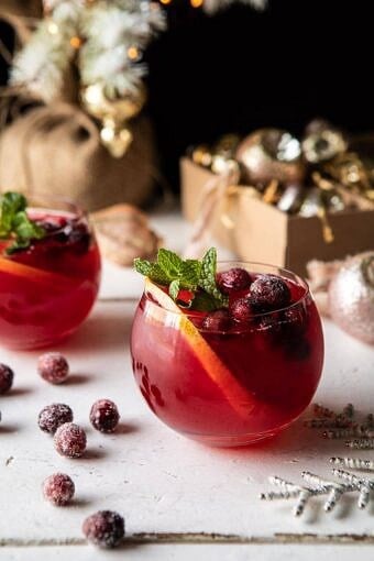 Jingle Bell Cranberry Paloma | halfbakedharvest.com #tequila #christmasdrinksaturday #holiday